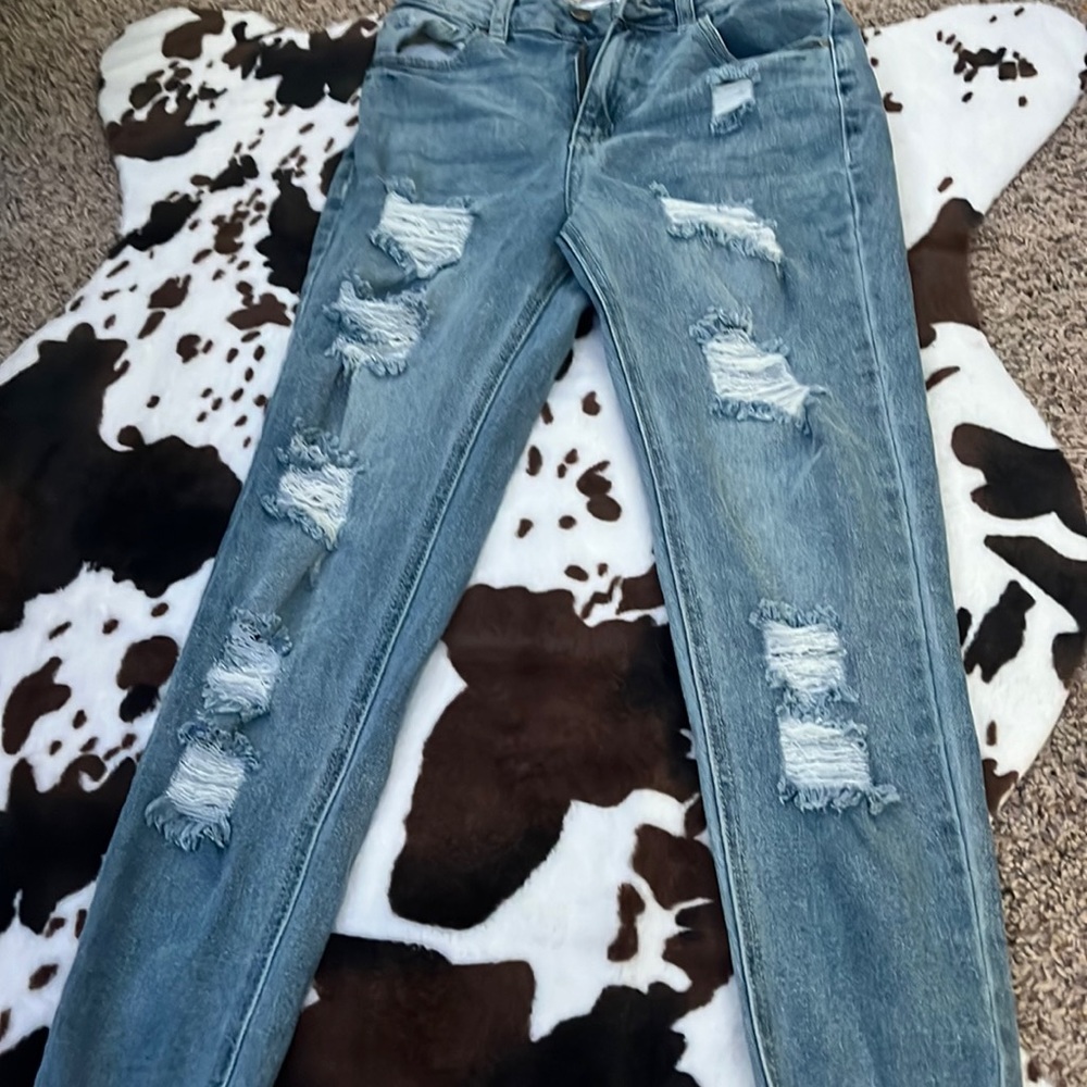 blue ripped jeans